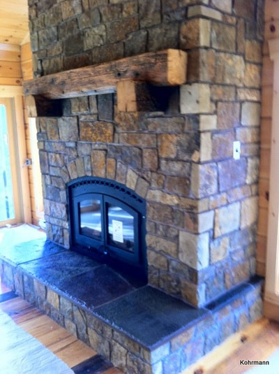Custom stone fireplace by Keystone Ceramics